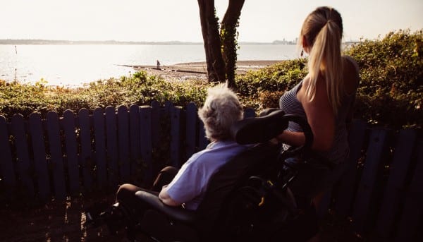 disabled guest and carer admiring the sea view at Netley Waterside House