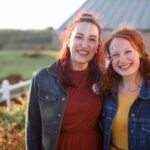 Two young women volunteers at Revitalise Sandpipers