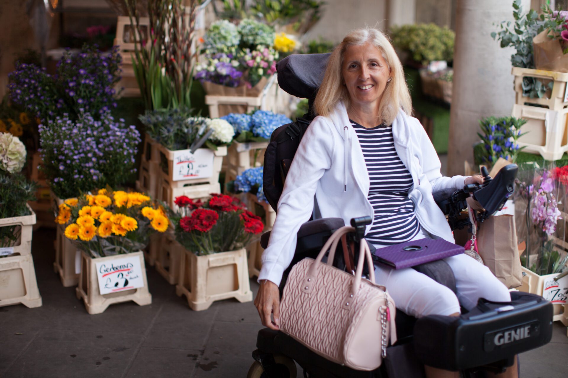 Woman enjoying a shopping excursion during a Revitalise break