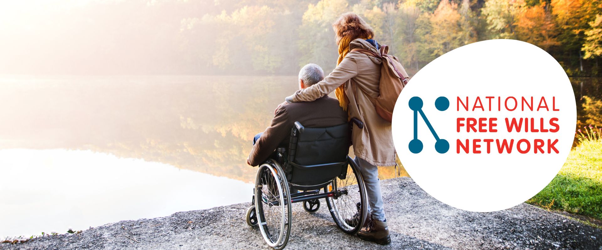 Woman standing next to man in wheelchair, both overlooking a lake with autumn foliage in the background. A white bubble with the Free Wills Network logo is overlaid on the righthand side.