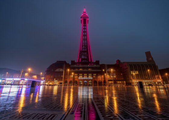 Blackpool tower lit up pink to support Revitalise
