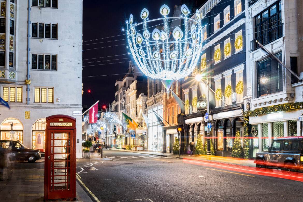 Nightscape photo of Christmas lights on a busy street in London