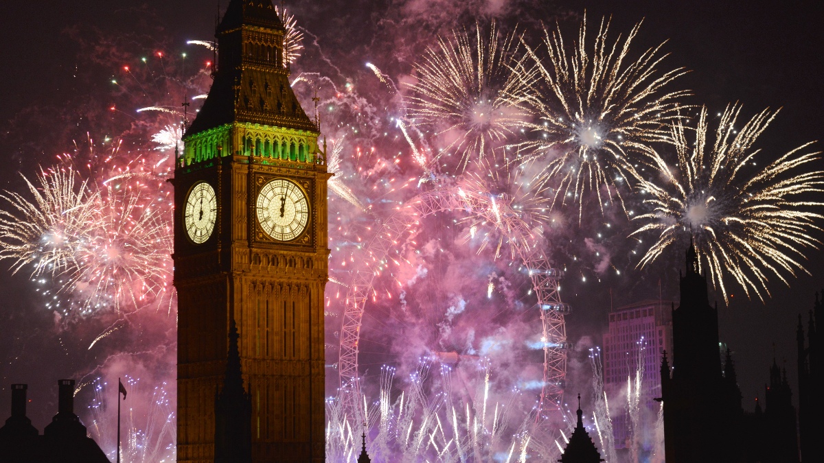 An aerial image of fireworks in London sky on New Years eve. The image also shows the Big Bang tower with clock striking 12.