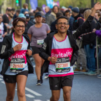 Two runners from Team Revitalise running the London Marathon 2024 to raise funds for respite breaks for disabled people and their carers
