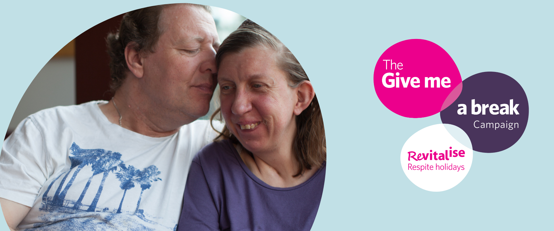 Graphic image showing a man and woman cuddling and Revitalise's Give me a break campaign logo against a light blue background